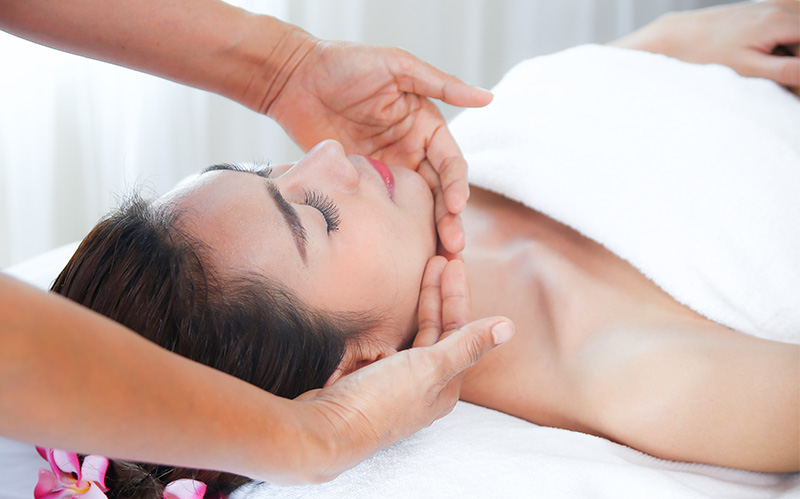 woman-receiving-professional-facial-treatment-and-soothing-face-massage